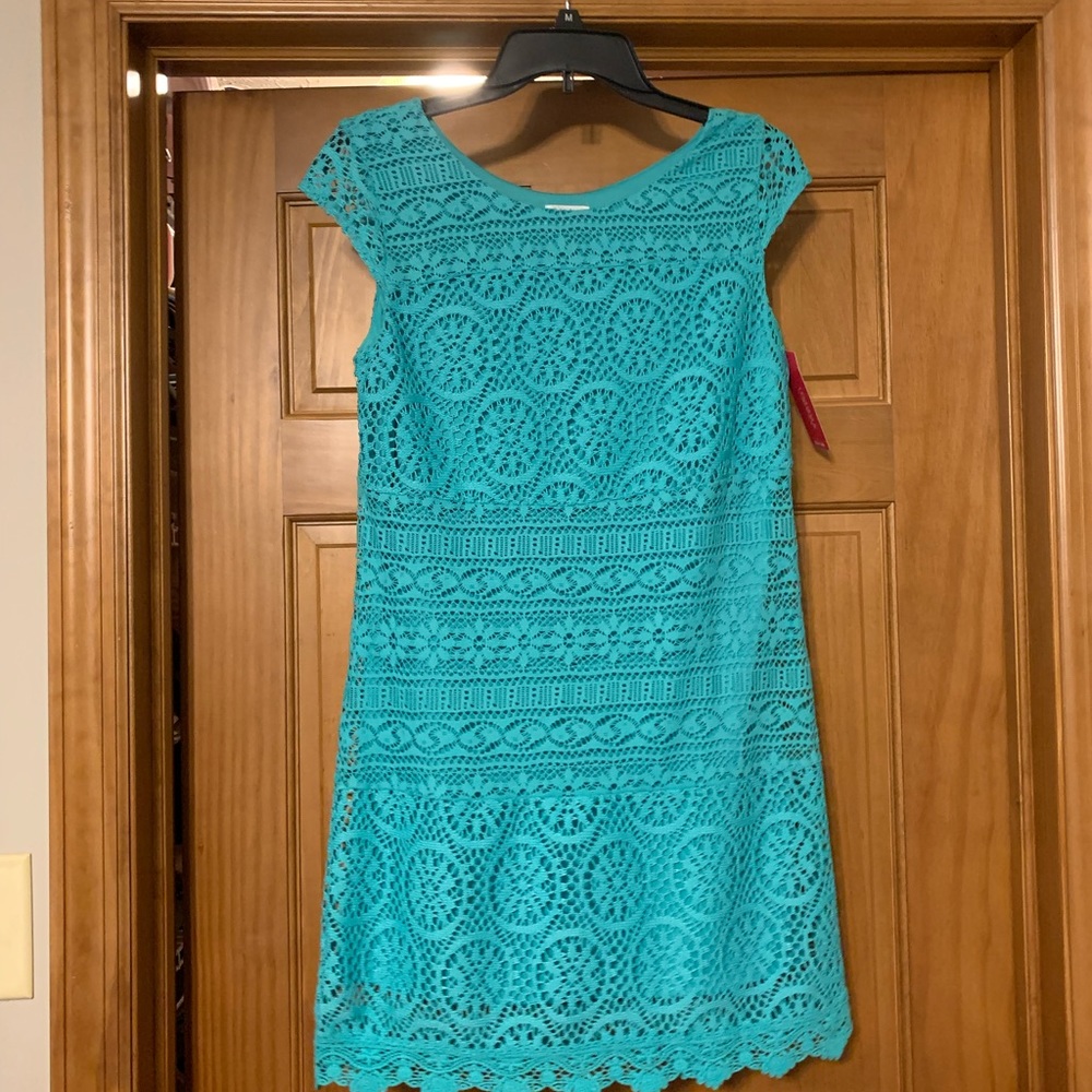 Teal lace dress size medium. New with tags